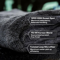 Phinish streak-free glass towel delivering crystal-clear windows after detailing.