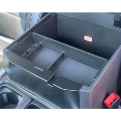 PIMCAR organized storage ready for daily essentials in the console.