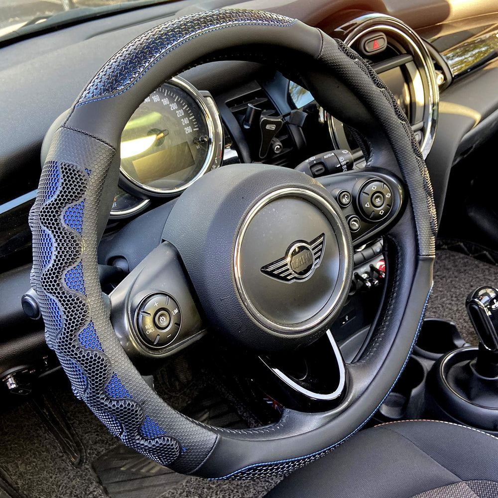 PINCTROT steering wheel cover with a 3D honeycomb design for secure, comfortable grip.