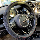 PINCTROT steering wheel cover with great grip and 3D honeycomb texture for secure handling.