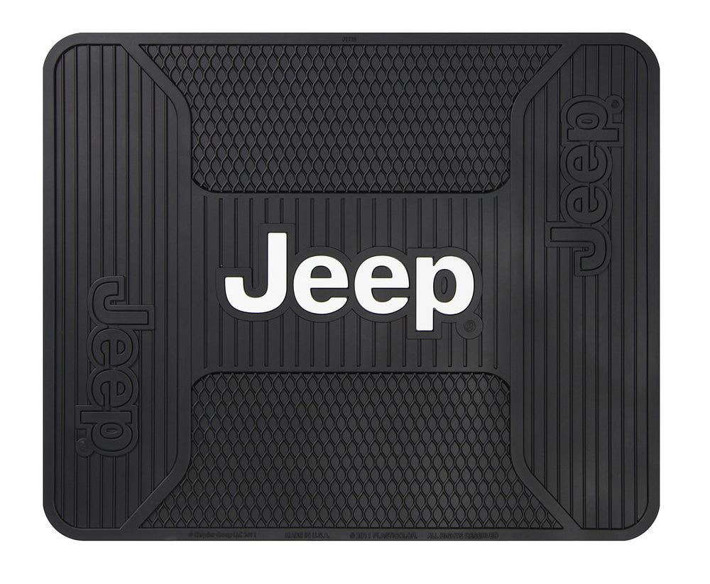 Plasticolor Jeep Elite rear seat mat logo close-up showing durable PVC surface for protection.
