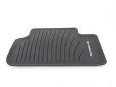 Porsche Macan embossed logo detail adds premium branding.