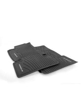 Porsche Macan all-weather front-left mat with embossed logo protects against dirt.