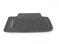 Porsche Macan waterproof mat demonstrates easy removal for cleaning.
