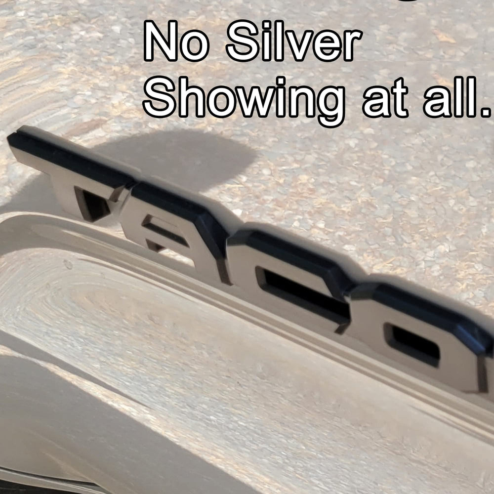 POSPICE ABS plastic overlay resists fading and wear on Tacoma badges.