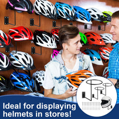 Potchen black metal wall mount keeps helmets off the floor and within reach.