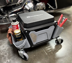 Powerbuilt brake stool with lockable wheels for stable positioning.