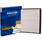 Premium Guard PA99365 engine air filter in a Subaru Forester for cleaner intake air.