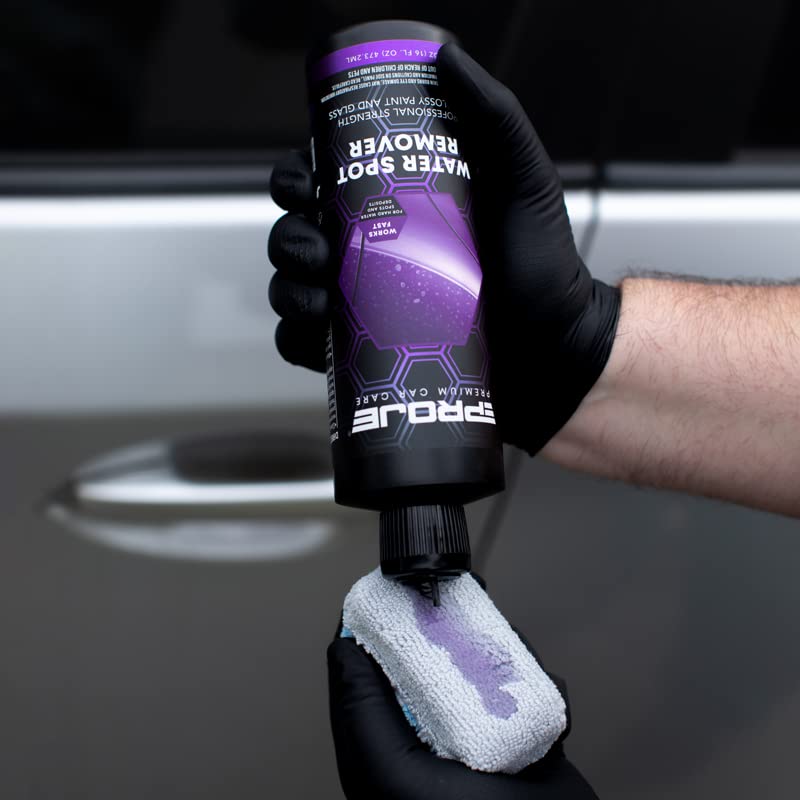 PROJE' Water Spot Remover on painted car panel restoring clarity.