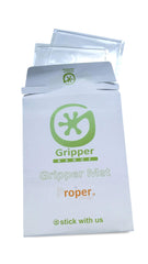 Proper Design Gripper Mats on aluminum panels keep signs in place without glue.