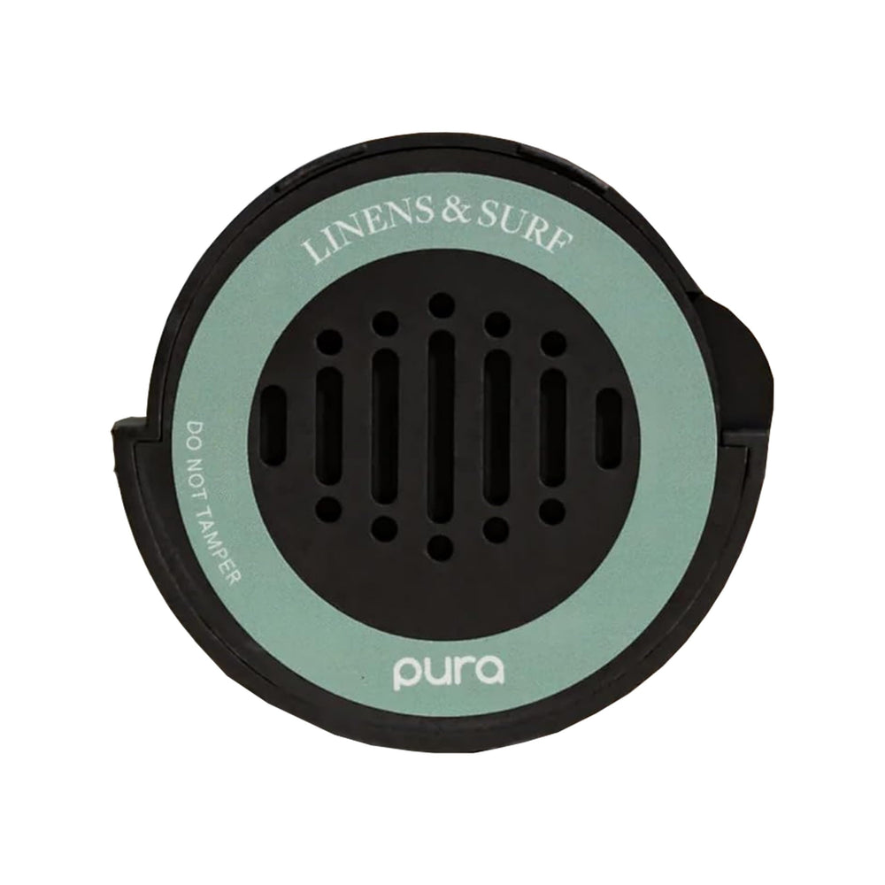 Pura Car Diffuser Refill Linen & Surf bottle delivers fresh, beach-inspired fragrance.