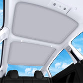 QINQINTU Model 3 sunshade on glass roof for a seamless, sag-free fit.