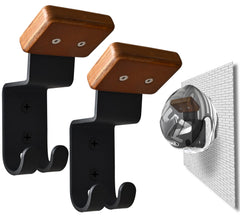 Qktxktzy wall-mounted helmet rack demonstrates organized garage storage.
