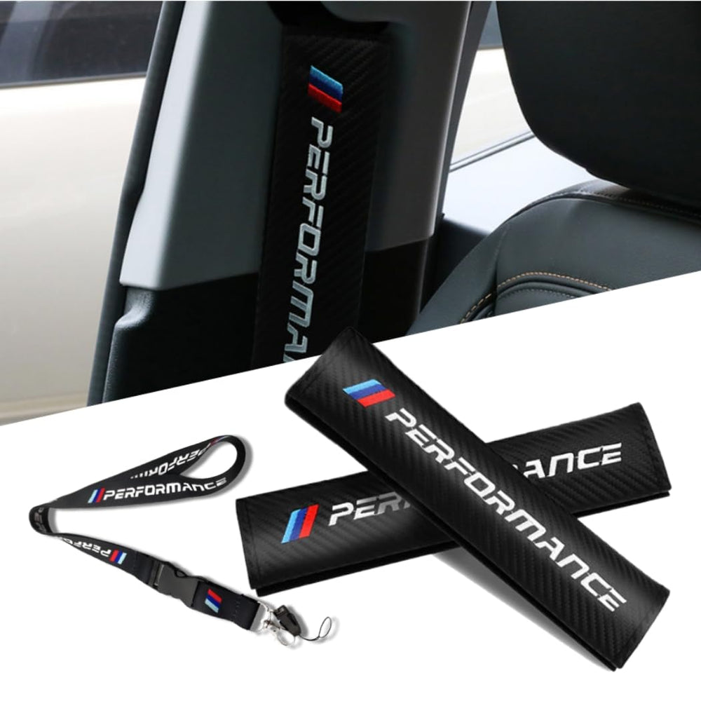 QOMAGO Car M seat belt cover with carbon fiber texture enhances interior style and comfort.