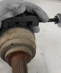 Qziulr Zlirfy CV boot clamp tool in use for quick tightening.