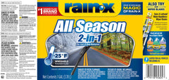 Pouring Rain-X washer fluid into a reservoir to boost windshield clarity.