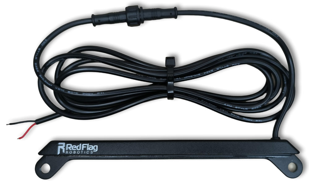 Red Flag Robotics universal license light enhances rear visibility for full-size US plates.
