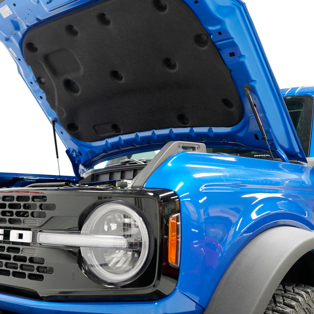 Hood mount hardware zinc plated and black-coated by Redline Tuning.