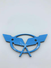 The REIXS C5 deck lid badge is a 3D emblem for an OEM-style upgrade.