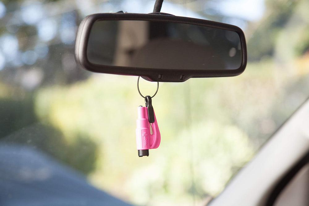RESQME concealed razor blade cutting a jammed seatbelt safely