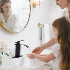 RNDIOZD matte black faucet installed with deck plate for 1- or 3-hole sinks