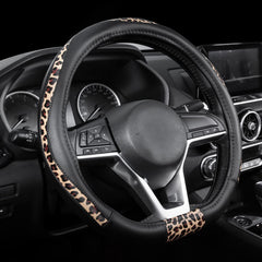 Road Comforts D-Type leopard front view steering wheel cover enhances grip and style.