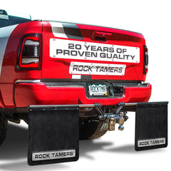 Rock Tamers mudflap system attached to a 3in hitch connection protecting the trailer and tow vehicle.