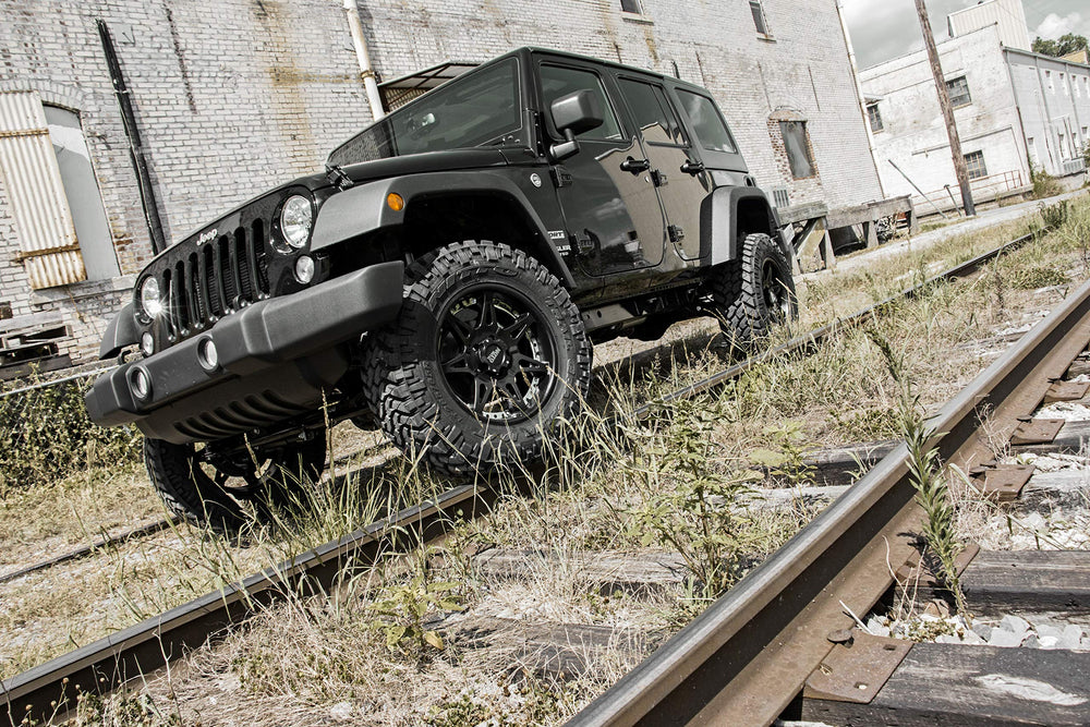Rough Country 2.5-inch lift kit bolt-on components laid out for easy at-home installation.