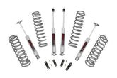 Rough Country 2.5-inch lift kit front coil springs raise JK Unlimited for improved ground clearance.