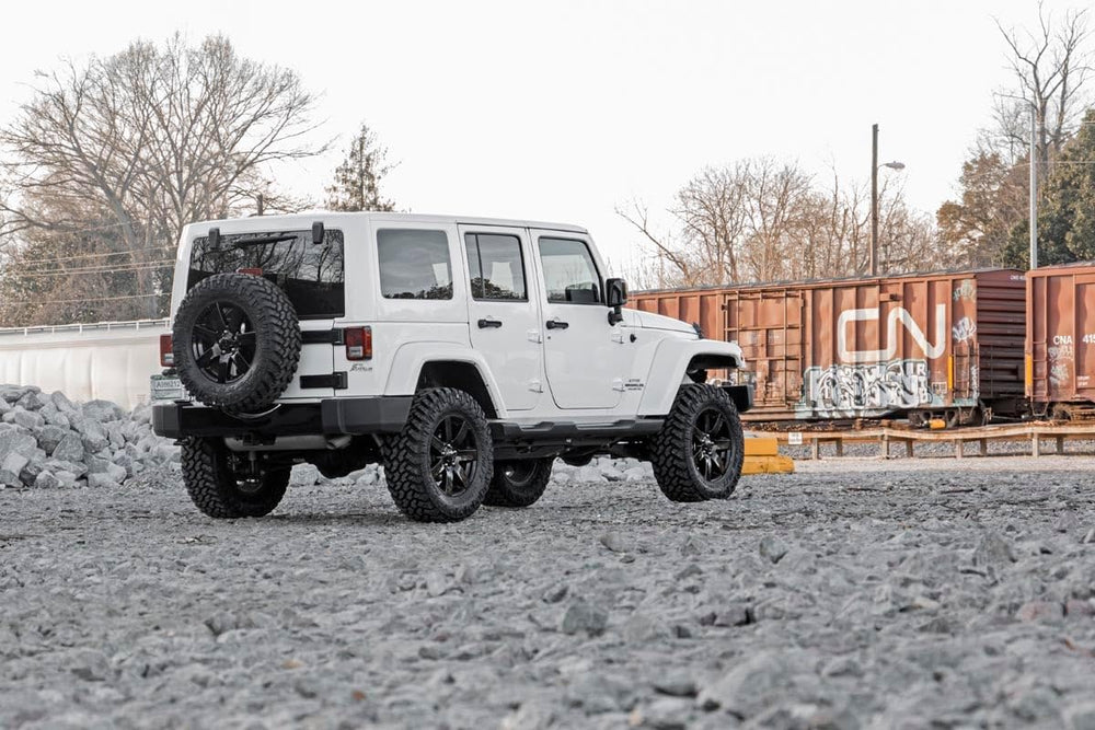 Rough Country lift kit on rugged trail demonstrates improved clearance and off-road capability.
