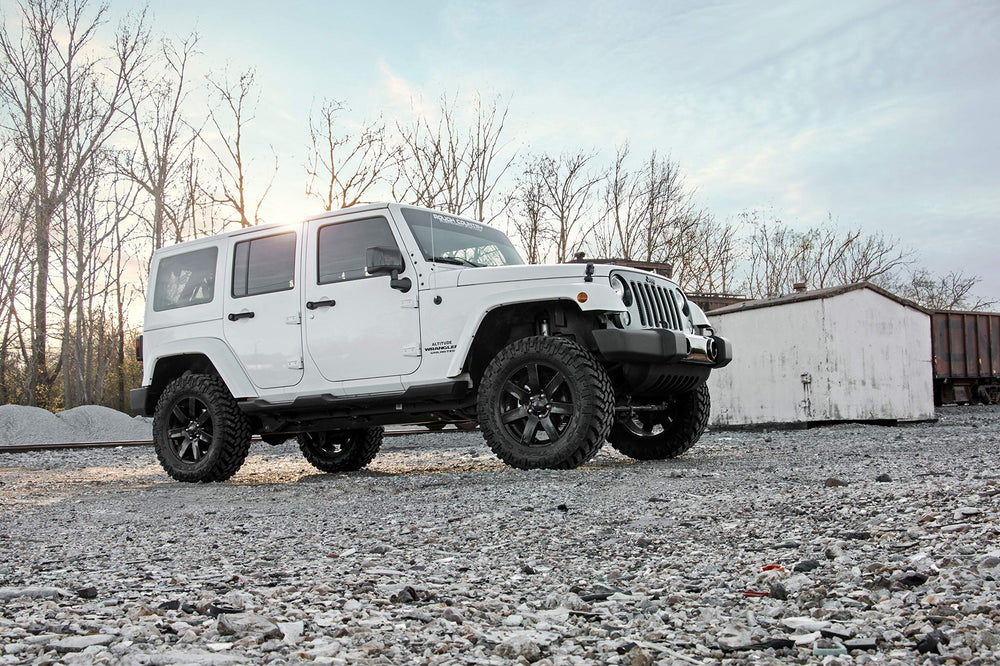 Rough Country 2.5-inch lift kit warranty card highlights Limited Lifetime Warranty.