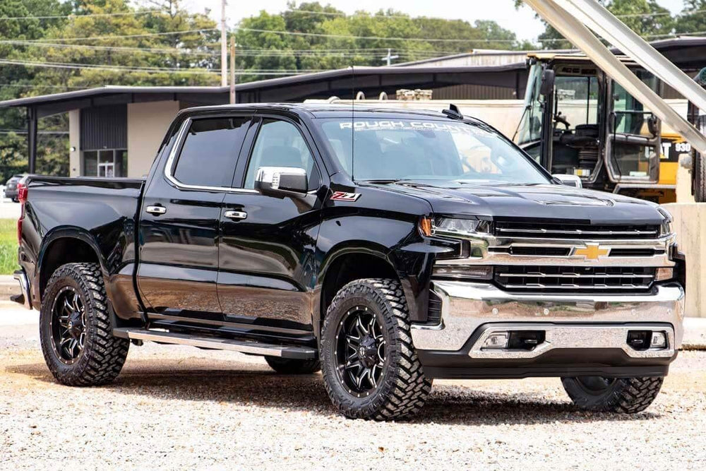 Truck equipped with Rough Country 2-Inch Leveling Kit on the front