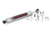 Rough Country N3 steering stabilizer on a Ram 2500/3500, side view, enhancing stability on rough roads.