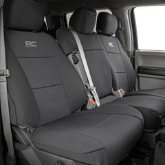 Rough Country neoprene front seat cover for Ford F-150 front bench protects against spills.