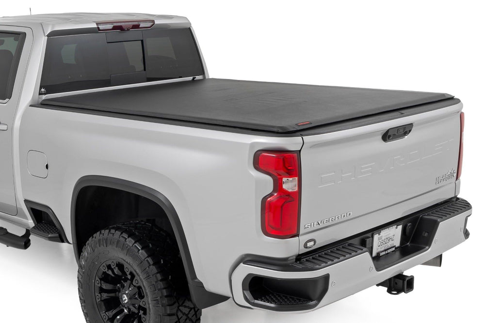 Rough Country soft roll-up bed cover on the Chevy Silverado 6-9 bed provides quick bed access.