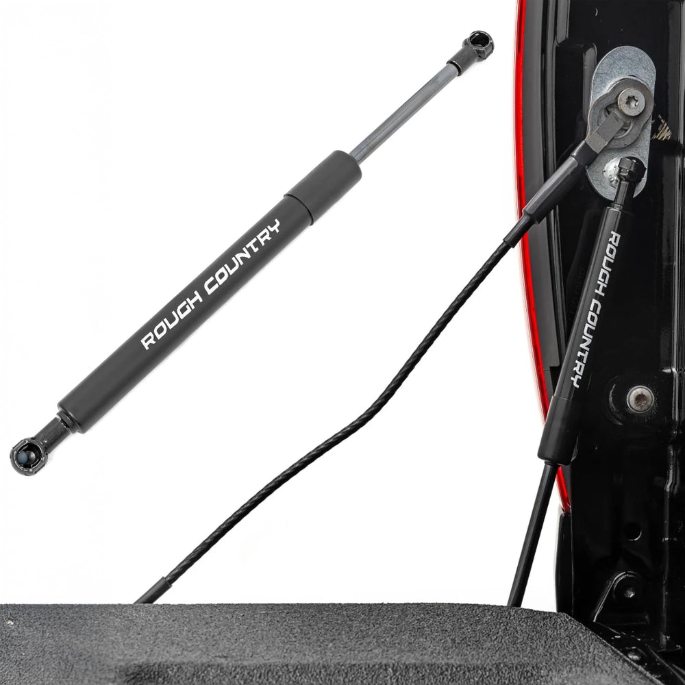 Rough Country tailgate assist on driver-side mount showing smooth release