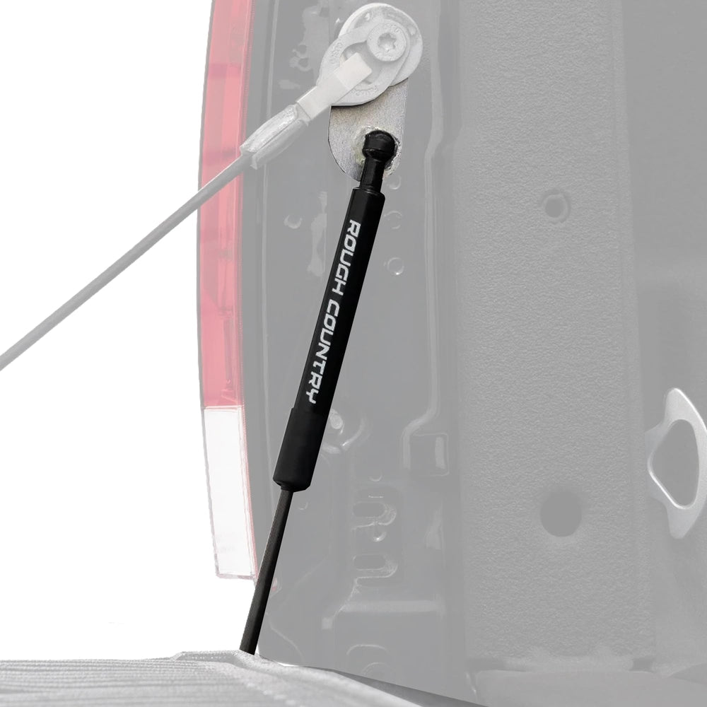 Rough Country tailgate assist on Ford F-250/F-350 side view enables smooth lowering