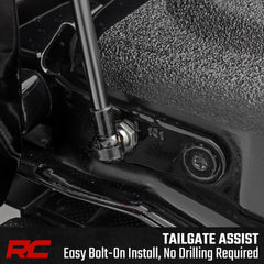 Rough Country tailgate assist in action with handle pull