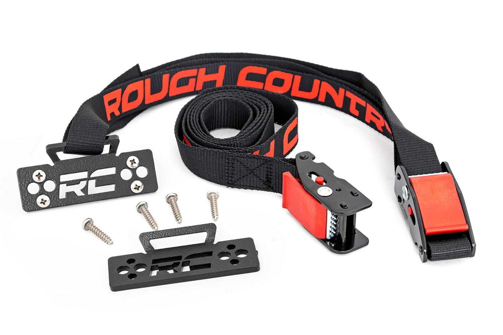 Rough Country 1in cam strap in action securing a cooler in a UTV bed.