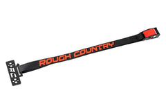 Rough Country black straps securing roto-molded cooler during off-road ride.