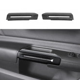 RT-TCZ carbon fiber door handle trim for Mustang interior upgrade.