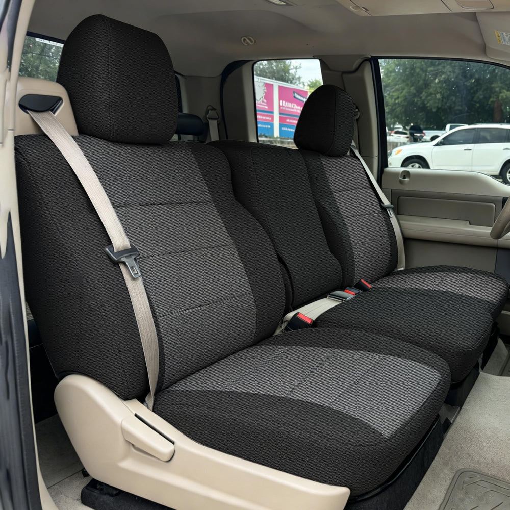 Runfider front split bench seat cover in black protecting Oxford seats from spills