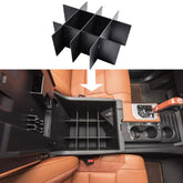 RunRoad center console divider installed in Toyota Tundra for organized storage.