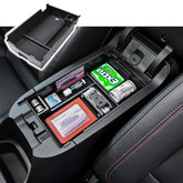 RUNROAD center console organizer in Equinox front view shows tidy storage.