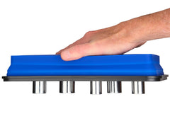 SANDOR collapsible magnetic parts tray expanded on a metal surface for quick access to fasteners.