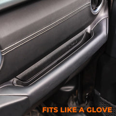 Durable black ABS GrabTray blends with cabin aesthetics and adds storage.
