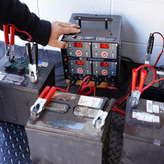 Schumacher DSR125 cables and clamps ready for four-bank charging