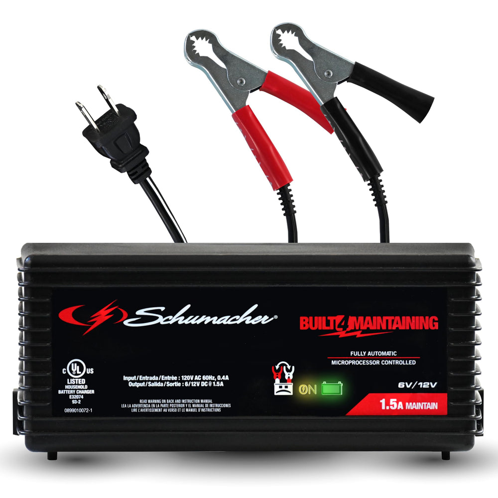 Schumacher SC1355 battery charger setup with quick-connect clamps for easy garage use.