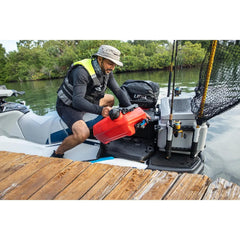 Sea-Doo LinQ rod holder in use securing rod with molded rubber cap