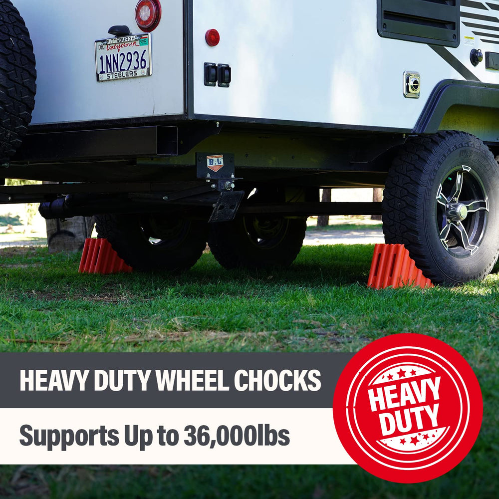 Solid polypropylene chocks resist impact while stabilizing large vehicles.